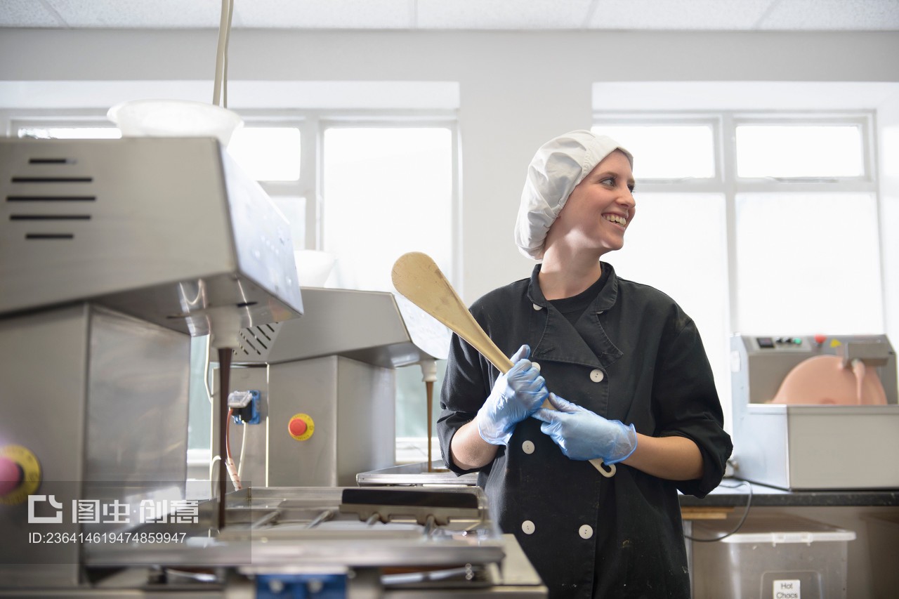 Candid portrait of chocolatier in sweet factory